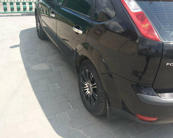 Черный Форд Фокус, объемом двигателя 1.6 л и пробегом 196 тыс. км за 4100 $, фото 5 на Automoto.ua