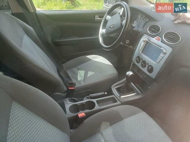 Черный Форд Фокус, объемом двигателя 1.6 л и пробегом 228 тыс. км за 3850 $, фото 15 на Automoto.ua