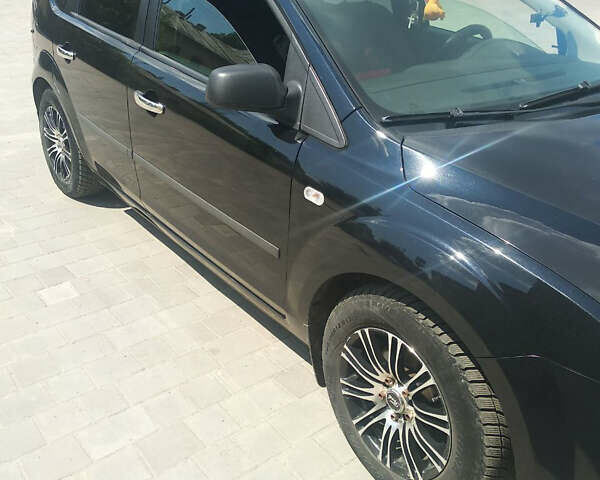 Черный Форд Фокус, объемом двигателя 1.6 л и пробегом 196 тыс. км за 4100 $, фото 2 на Automoto.ua