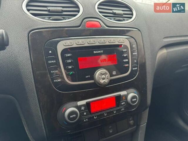 Чорний Форд Фокус, об'ємом двигуна 2 л та пробігом 313 тис. км за 3250 $, фото 14 на Automoto.ua