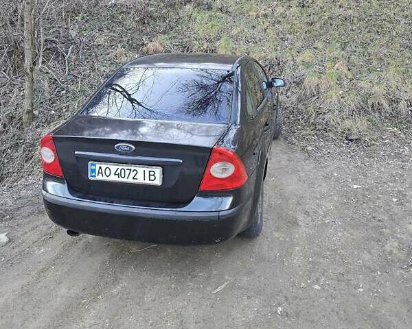 Черный Форд Фокус, объемом двигателя 1.6 л и пробегом 247 тыс. км за 5000 $, фото 5 на Automoto.ua