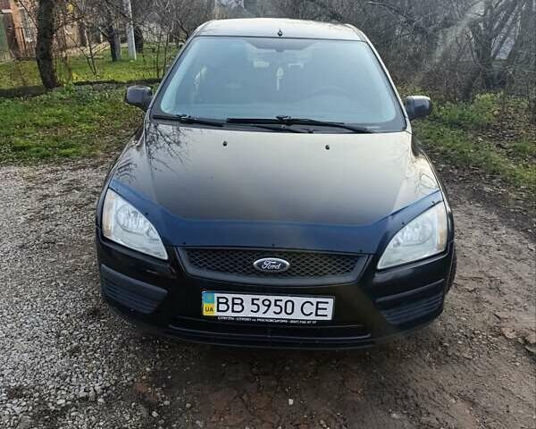 Черный Форд Фокус, объемом двигателя 1.6 л и пробегом 233 тыс. км за 3400 $, фото 3 на Automoto.ua