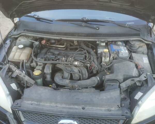 Черный Форд Фокус, объемом двигателя 1.6 л и пробегом 376 тыс. км за 2992 $, фото 1 на Automoto.ua