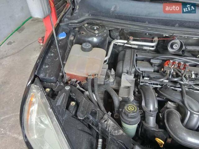 Черный Форд Фокус, объемом двигателя 1.6 л и пробегом 228 тыс. км за 3850 $, фото 8 на Automoto.ua