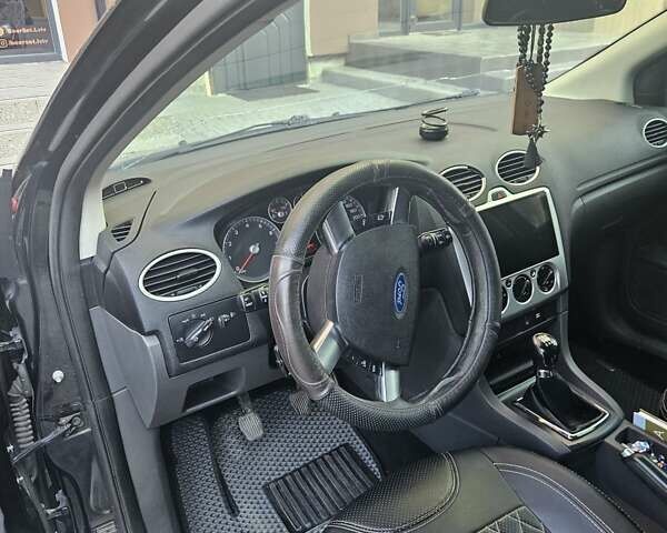 Черный Форд Фокус, объемом двигателя 1.6 л и пробегом 290 тыс. км за 5000 $, фото 4 на Automoto.ua