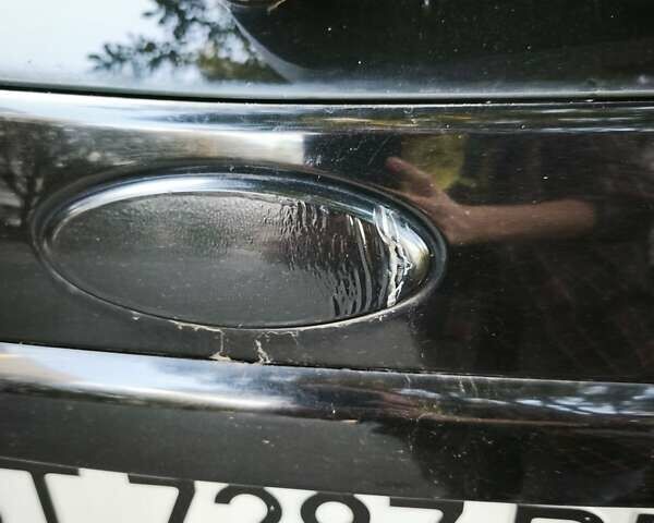 Черный Форд Фокус, объемом двигателя 1.6 л и пробегом 155 тыс. км за 4100 $, фото 7 на Automoto.ua