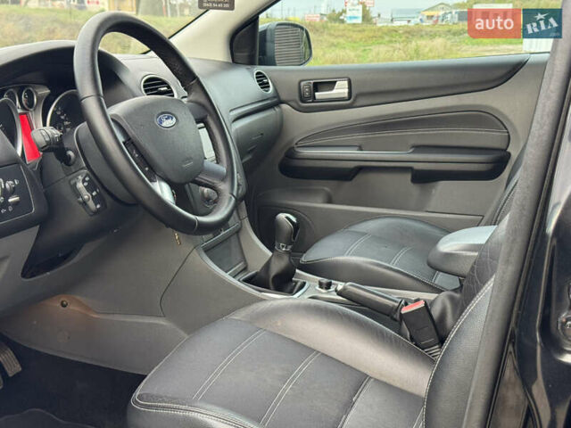 Черный Форд Фокус, объемом двигателя 1.8 л и пробегом 193 тыс. км за 5999 $, фото 44 на Automoto.ua