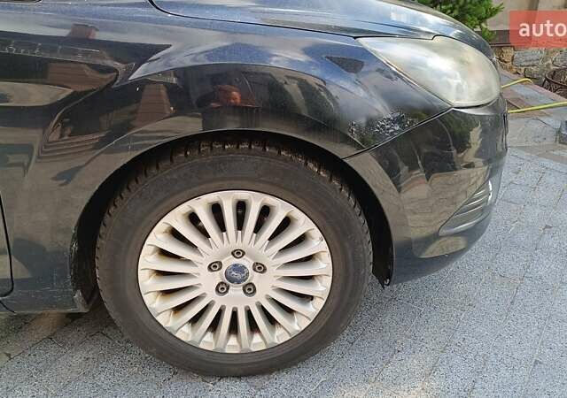 Черный Форд Фокус, объемом двигателя 1.8 л и пробегом 287 тыс. км за 6800 $, фото 48 на Automoto.ua