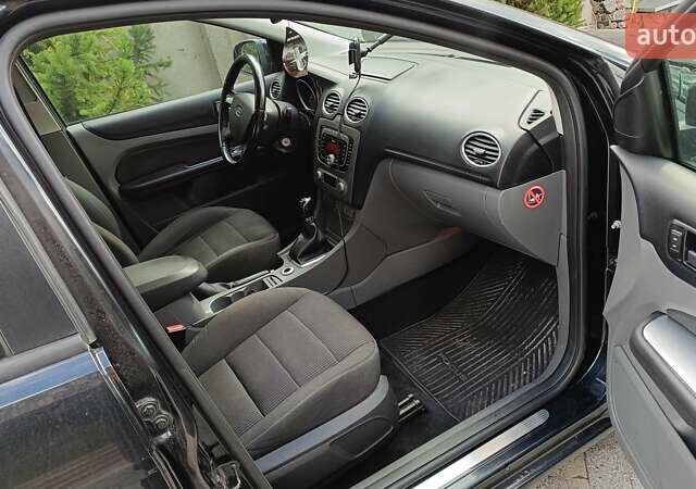 Черный Форд Фокус, объемом двигателя 1.8 л и пробегом 287 тыс. км за 6800 $, фото 17 на Automoto.ua