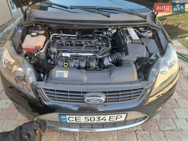 Черный Форд Фокус, объемом двигателя 2 л и пробегом 150 тыс. км за 4550 $, фото 5 на Automoto.ua