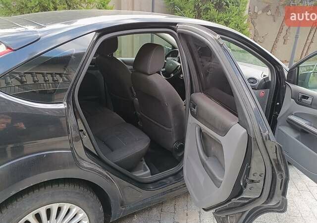 Черный Форд Фокус, объемом двигателя 1.8 л и пробегом 287 тыс. км за 6800 $, фото 15 на Automoto.ua