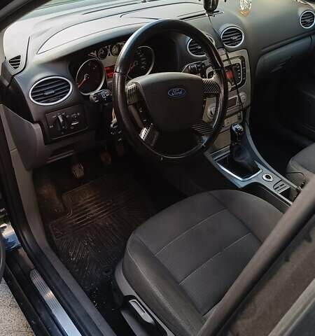 Черный Форд Фокус, объемом двигателя 1.8 л и пробегом 287 тыс. км за 6800 $, фото 31 на Automoto.ua