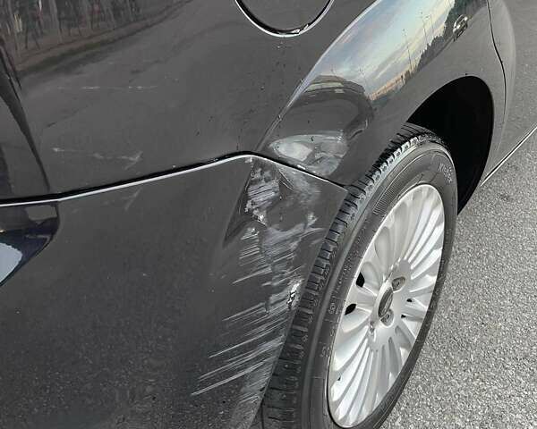 Черный Форд Фокус, объемом двигателя 1.8 л и пробегом 245 тыс. км за 7000 $, фото 72 на Automoto.ua