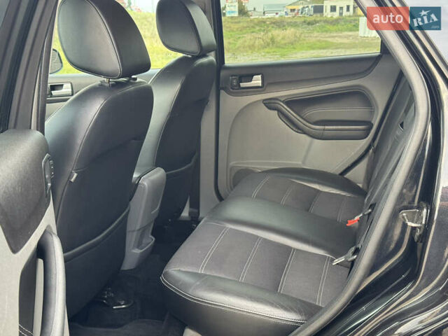 Черный Форд Фокус, объемом двигателя 1.8 л и пробегом 193 тыс. км за 5999 $, фото 69 на Automoto.ua