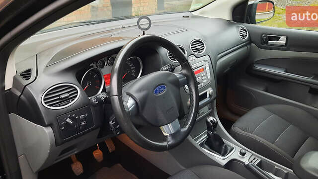 Черный Форд Фокус, объемом двигателя 1.8 л и пробегом 189 тыс. км за 5500 $, фото 24 на Automoto.ua