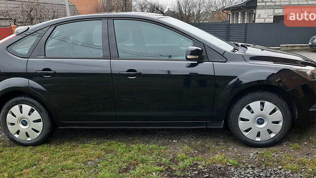 Черный Форд Фокус, объемом двигателя 1.8 л и пробегом 189 тыс. км за 5500 $, фото 11 на Automoto.ua