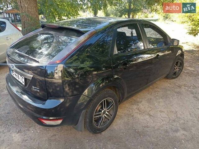 Чорний Форд Фокус, об'ємом двигуна 1.6 л та пробігом 285 тис. км за 4650 $, фото 5 на Automoto.ua