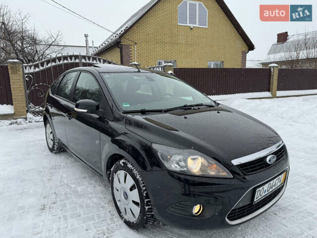 Черный Форд Фокус, объемом двигателя 1.8 л и пробегом 189 тыс. км за 5650 $, фото 9 на Automoto.ua