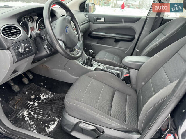 Черный Форд Фокус, объемом двигателя 1.8 л и пробегом 189 тыс. км за 5650 $, фото 17 на Automoto.ua