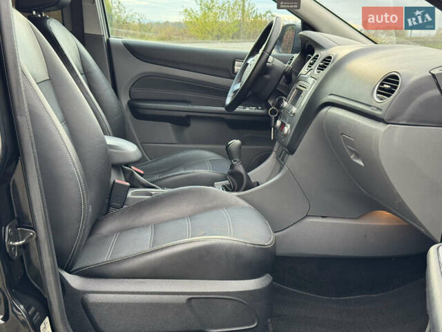 Черный Форд Фокус, объемом двигателя 1.8 л и пробегом 193 тыс. км за 5999 $, фото 84 на Automoto.ua