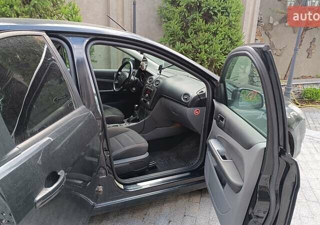 Черный Форд Фокус, объемом двигателя 1.8 л и пробегом 287 тыс. км за 6800 $, фото 16 на Automoto.ua