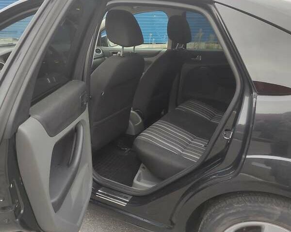 Черный Форд Фокус, объемом двигателя 1.6 л и пробегом 266 тыс. км за 5700 $, фото 10 на Automoto.ua