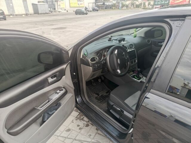 Черный Форд Фокус, объемом двигателя 1.6 л и пробегом 305 тыс. км за 5500 $, фото 7 на Automoto.ua