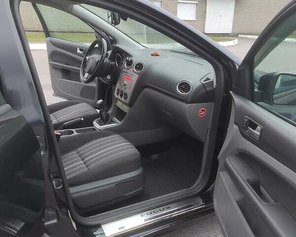 Черный Форд Фокус, объемом двигателя 1.6 л и пробегом 266 тыс. км за 5700 $, фото 13 на Automoto.ua