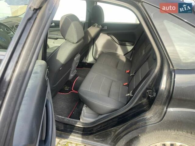 Чорний Форд Фокус, об'ємом двигуна 1.8 л та пробігом 260 тис. км за 5190 $, фото 10 на Automoto.ua