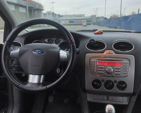 Черный Форд Фокус, объемом двигателя 1.6 л и пробегом 266 тыс. км за 5700 $, фото 14 на Automoto.ua