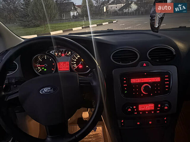 Черный Форд Фокус, объемом двигателя 1.8 л и пробегом 240 тыс. км за 5100 $, фото 17 на Automoto.ua