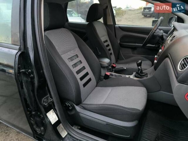 Черный Форд Фокус, объемом двигателя 1.56 л и пробегом 282 тыс. км за 5990 $, фото 11 на Automoto.ua