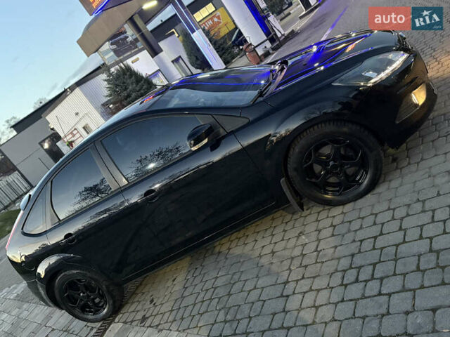 Черный Форд Фокус, объемом двигателя 1.8 л и пробегом 240 тыс. км за 5100 $, фото 5 на Automoto.ua