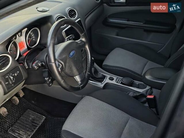 Черный Форд Фокус, объемом двигателя 1.6 л и пробегом 189 тыс. км за 5599 $, фото 20 на Automoto.ua