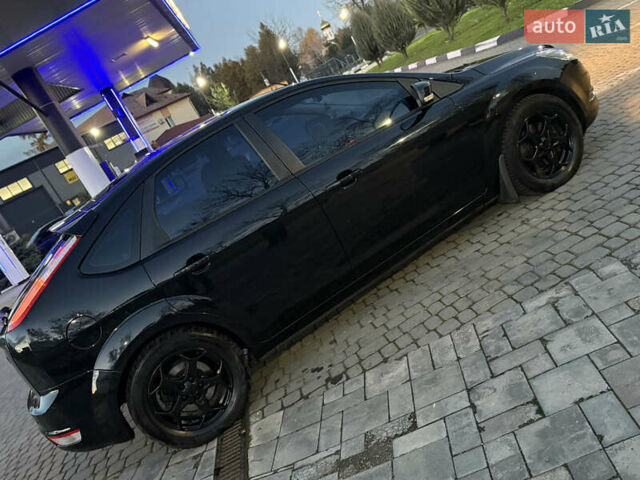 Черный Форд Фокус, объемом двигателя 1.8 л и пробегом 240 тыс. км за 5100 $, фото 7 на Automoto.ua