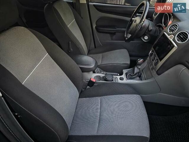 Черный Форд Фокус, объемом двигателя 1.6 л и пробегом 189 тыс. км за 5599 $, фото 28 на Automoto.ua