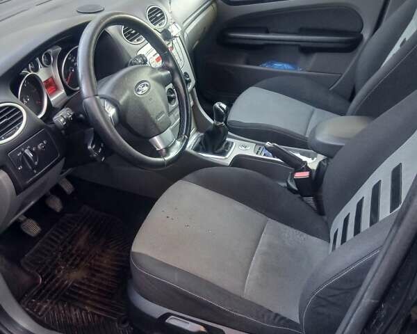 Черный Форд Фокус, объемом двигателя 1.8 л и пробегом 213 тыс. км за 6200 $, фото 4 на Automoto.ua