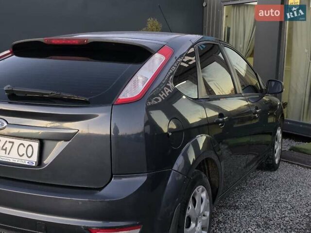 Черный Форд Фокус, объемом двигателя 1.6 л и пробегом 189 тыс. км за 5599 $, фото 17 на Automoto.ua