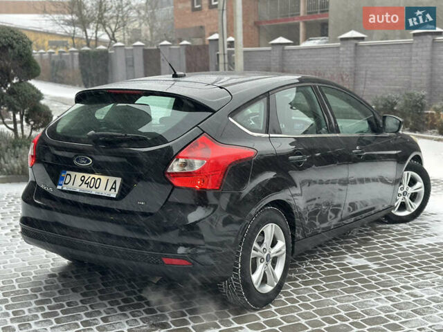Чорний Форд Фокус, об'ємом двигуна 2 л та пробігом 164 тис. км за 6299 $, фото 15 на Automoto.ua