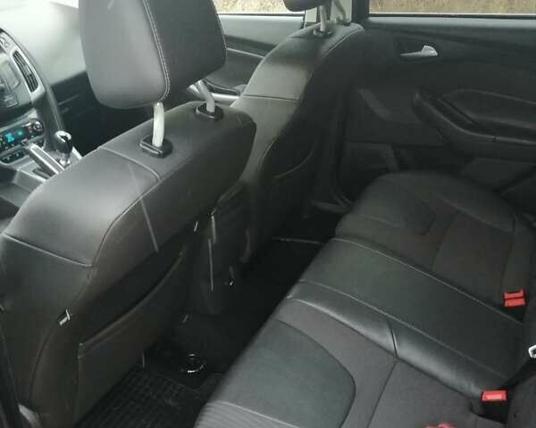 Черный Форд Фокус, объемом двигателя 1.56 л и пробегом 232 тыс. км за 7200 $, фото 9 на Automoto.ua