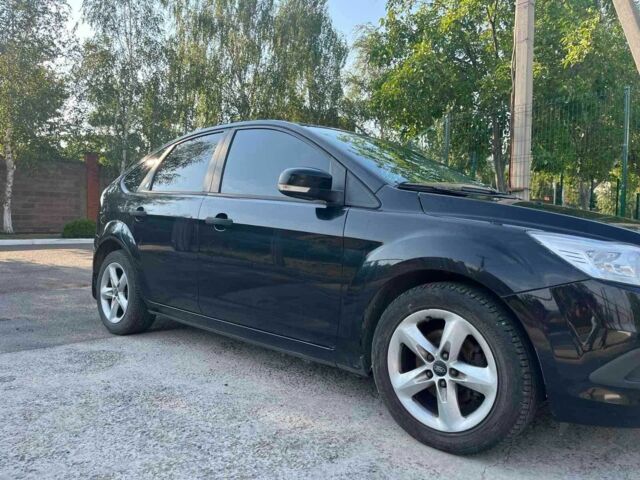 Черный Форд Фокус, объемом двигателя 1.4 л и пробегом 135 тыс. км за 5000 $, фото 1 на Automoto.ua