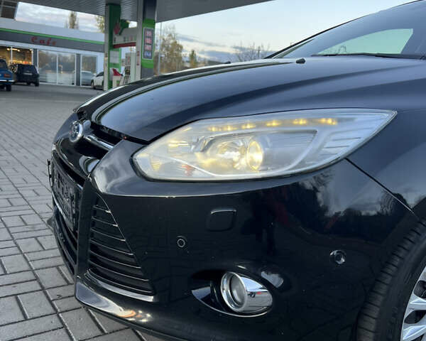 Черный Форд Фокус, объемом двигателя 1.6 л и пробегом 219 тыс. км за 7800 $, фото 14 на Automoto.ua