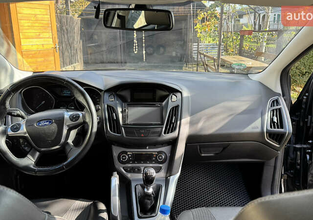 Черный Форд Фокус, объемом двигателя 1.6 л и пробегом 196 тыс. км за 8300 $, фото 10 на Automoto.ua