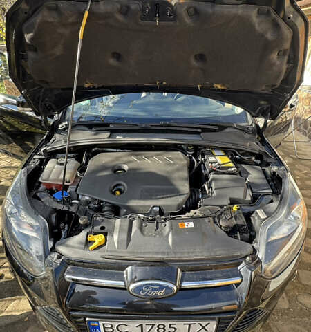 Черный Форд Фокус, объемом двигателя 1.6 л и пробегом 196 тыс. км за 8300 $, фото 7 на Automoto.ua