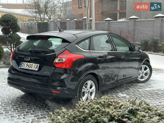 Чорний Форд Фокус, об'ємом двигуна 2 л та пробігом 164 тис. км за 6299 $, фото 17 на Automoto.ua