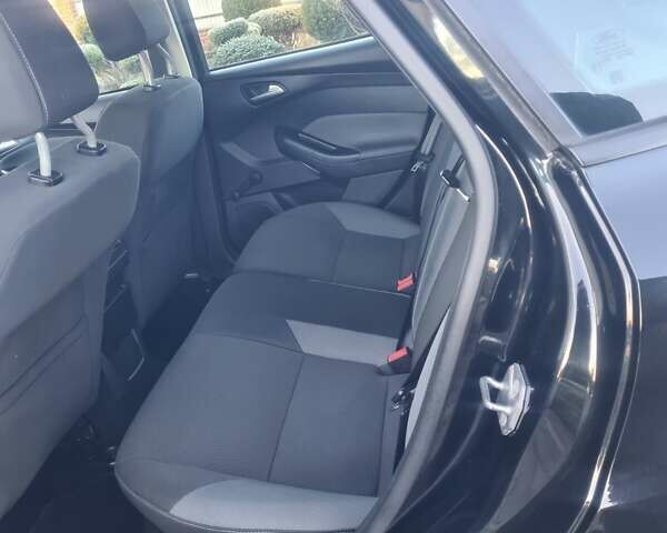 Черный Форд Фокус, объемом двигателя 1.6 л и пробегом 251 тыс. км за 6750 $, фото 38 на Automoto.ua