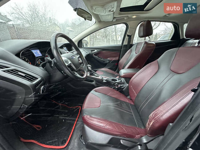 Чорний Форд Фокус, об'ємом двигуна 2 л та пробігом 164 тис. км за 6299 $, фото 22 на Automoto.ua