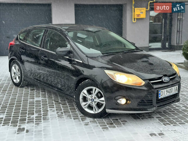 Чорний Форд Фокус, об'ємом двигуна 2 л та пробігом 164 тис. км за 6299 $, фото 6 на Automoto.ua