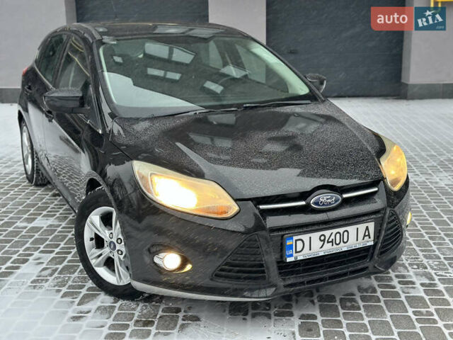 Чорний Форд Фокус, об'ємом двигуна 2 л та пробігом 164 тис. км за 6299 $, фото 4 на Automoto.ua