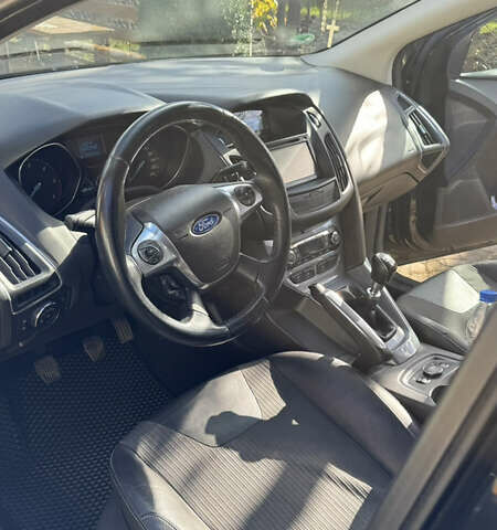 Черный Форд Фокус, объемом двигателя 1.6 л и пробегом 196 тыс. км за 8300 $, фото 6 на Automoto.ua